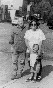 Bruce Selcraig, with wife Beth Hudson and son Cole, in
downtown Paoni