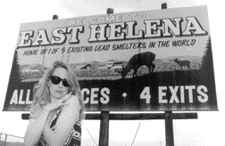 Lynette Russell in front of a billboard poses for
magazine
