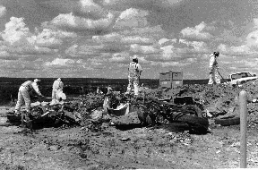 Navajo workers clean up illegal dump near Window Rock,
Ariz.