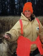 A BIRD IN HAND: George Covington's Dem daughter can hold
her own with a pheasant