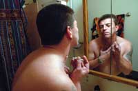 Ernie Archuleta shoots up in his neck because it's the only place left in his body where he can hit a vein, he says
